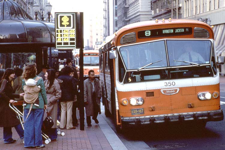 Riders boarding the number 8 bus in Portland's Transit Mall soon after opening
