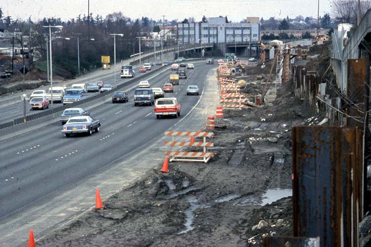Construction of Eastside MAX light rail along the westbound segment of the Banfield Freeway.