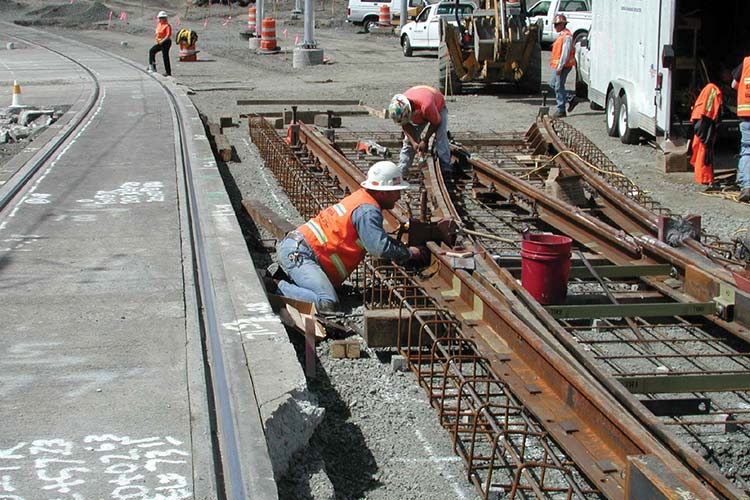 Workers doing construction on the Interstate MAX Yellow Line
